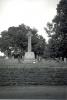 Celtic cross and surrounding headstones. 
