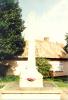 Obelisk and building in the background.