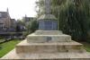 Stone cross on four-stepped base.