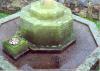 Second World War engraved inscription and names on memorial's base.