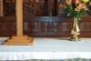 Engraved inscription on wooden altar panel.