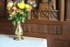 Engraved inscription on wooden altar panel.