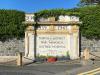 Large decorative stone out hospital with name and dates of World War 1 and World War 2