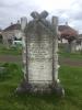 Stone gravestone shaped like a picture frame