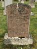 Salmon pink family gravestone with cambered top