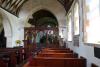 Overall view of tablet and church interior.
