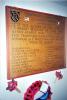 Wooden board with names.