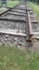 Small wooden crosses at the end of the railway.