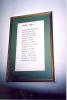 Framed roll of honour with Second World War names.