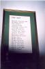 Framed roll of honour with First World War names.