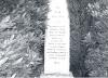 Monochrome picture of column highlighting roll of honour