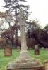 Cross with names engraved on it.