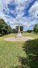 Stone cross mounted on octagonal base