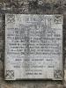 Granite tablet attached to wall
