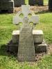 Marble gravestone, with a two step base topped with a Celtic Cross