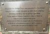 Plaque on back of memorial bench beside Wojtek