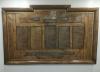 Rectangular wood board with brass trim and inscribed names