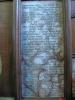Organ screen with marble tablets inset into limestone backboard. Inscription on the tablets.