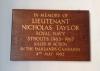 Wooden memorial board with gold lettering