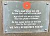 Plaque on seats in memorial garden