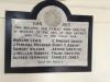 Nowy headed white marble plaque with black letters