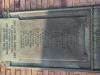 List of names attached to a wall in capital letters, who died in WW1. 
