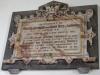 Wall-mounted stone tablet.