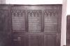 Carved wooden board across altar