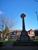 Photograph of memorial cross in context