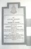 White marble plaque with black border