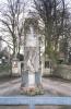 Stone monument with sculpture