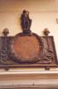 ornate wooden plaque bearing names