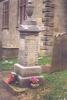 Stone obelisk with gilt lettering
