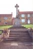 Cross at top of steps with inscribed names in base