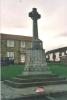 Cross at top of steps with inscribed names in base