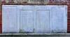 WW2 wall mounted tablet behind the WW1 memorial