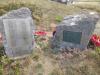 Both stones of remembrance adjacent to each other in grass