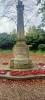The first side of the Obelisk on a two stepped base, showing a first world war inscription.  