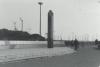 Black truncated obelisk that functions as a sundial