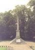 Tall, tapering obelisk on square steps with inscribed names in panel 