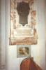Bronze plaque on pedimented marble tablet