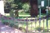 Gates with curved top and dedication within