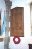 Wooden board/plaque inside church bearing names