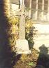 Celtic cross with names inscribed on its base.