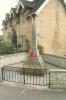 Obelisk set on steps, fenced in