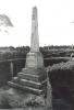 Four-stepped base, surmounted by a square tapering plinth and obelisk