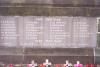 Plaque at base of cross