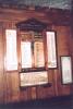 Wooden case triptych with folding sides and gabled top, names on each panel