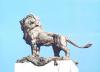Lion sculpture atop memorial 