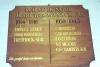Rectangular wooden board with inscription